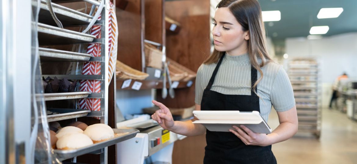 woman doing an inventory check in the bakery